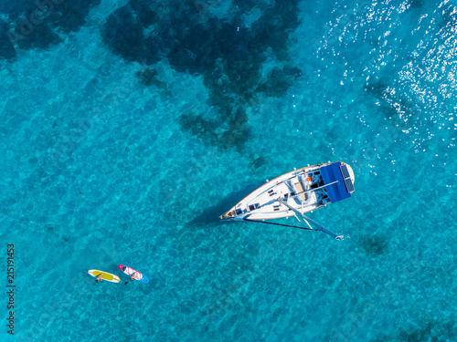 Aerial view to Yacht in deep blue sea. Drone photography © Max Topchii