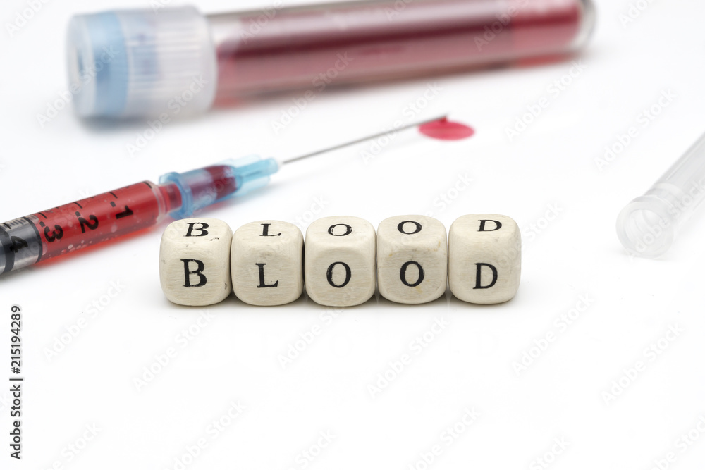 the 'BLOOD' concept of blood samples in the test tube, the droplets of the injection tip end the 'BLOOD' concept of blood samples in the test tube, the droplets of the injection tip end