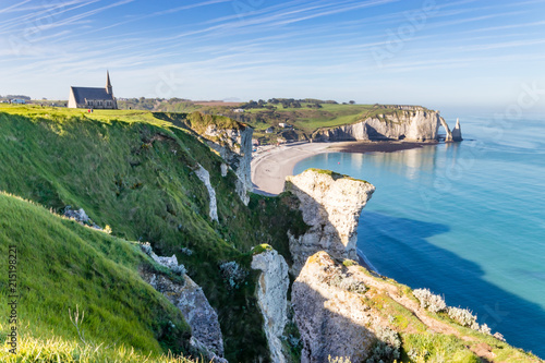 Aiguille Etretat cliff on the sea side and  limestone cliffs photo