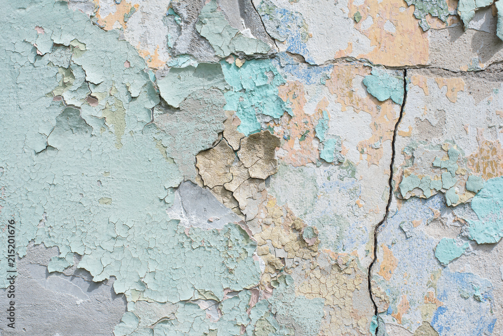 Obraz premium Close-up detail of cracked paint on wall.