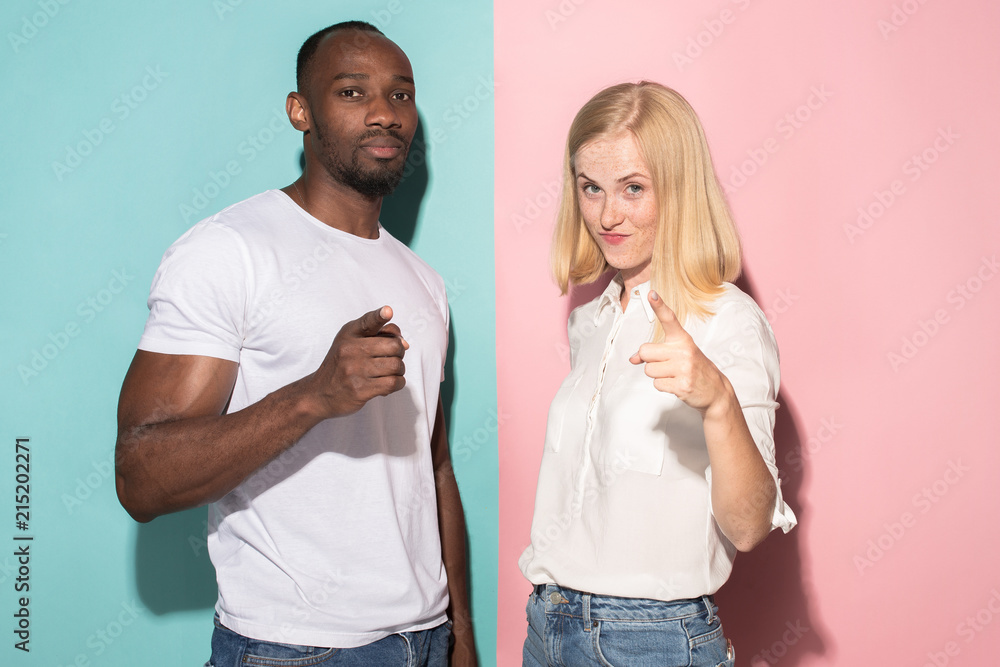 Man and woman posing at studio during quarrel