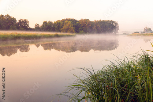 Morning fog on a quiet lake