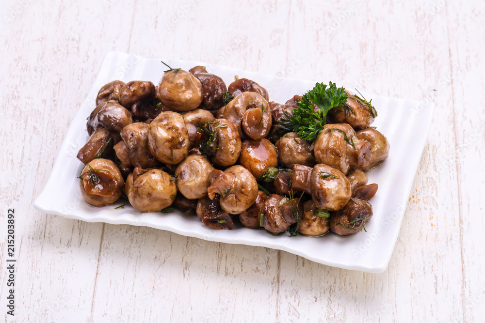 Fototapeta premium Pickled mushrooms in the bowl