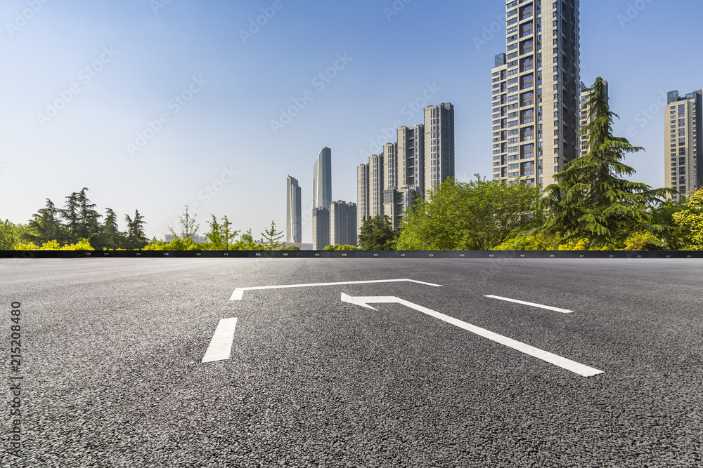 Panoramic skyline and modern business office buildings with empty road,empty concrete square floor