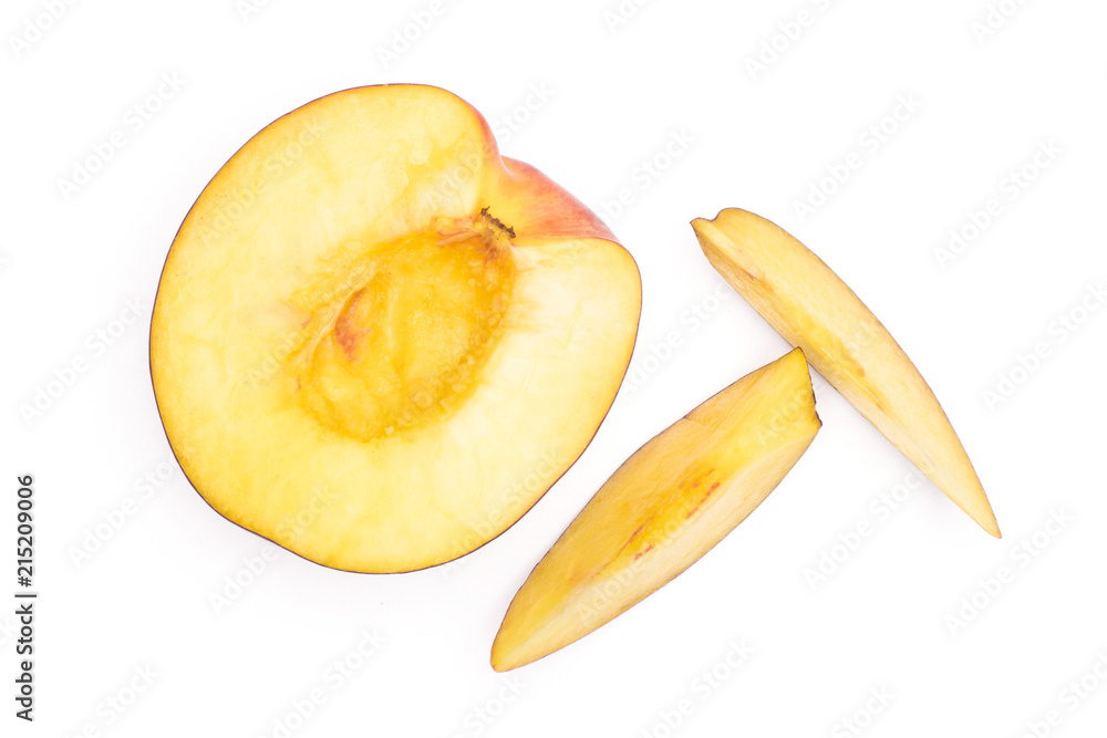 Group of one half two slices of ripe deep red nectarine flatlay isolated on white