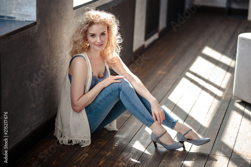 Close-up portrait of sweet blonde woman in a casual jeans clothes, fashion beauty photo