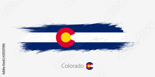 Flag of Colorado US State, grunge abstract brush stroke on gray background.