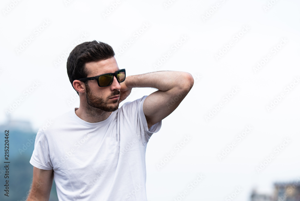 Pensive man in sunglasses Pensive man in sunglasses