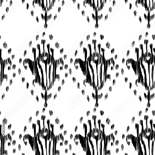 Ikat seamless bohemian ethnic black and white pattern in watercolour style. Watercolor ikat oriental ornaments for fabric, textile, wrapping