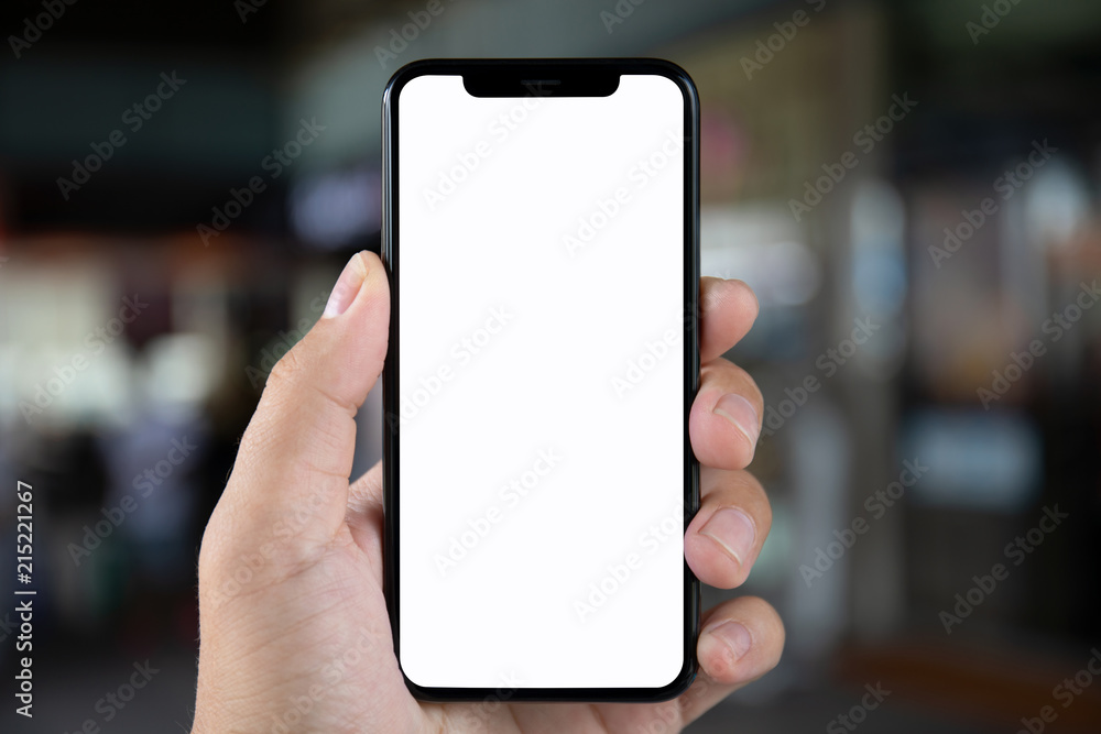 man hand holding phone with isolated screen on background city