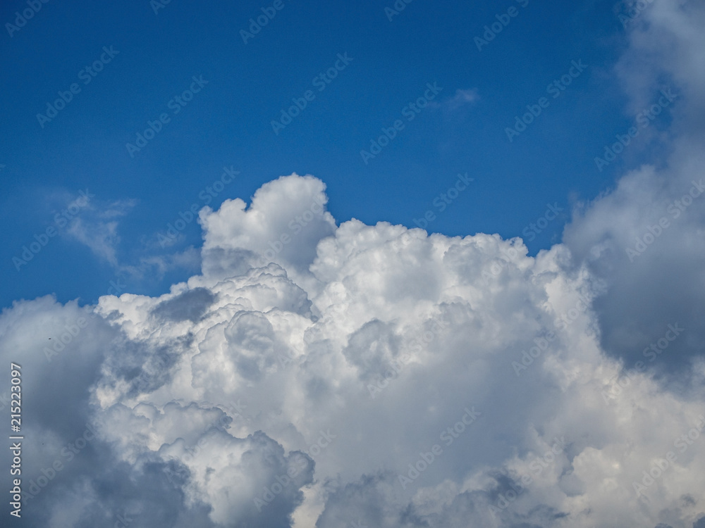 Cumulus clouds in the blue sky