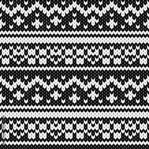 Abstract monochrome knitted seamless pattern. Knit texture sheme swatch for new year card, christmas invitation, holiday wrapping paper, winter vacation travel and ski resort advertising etc.