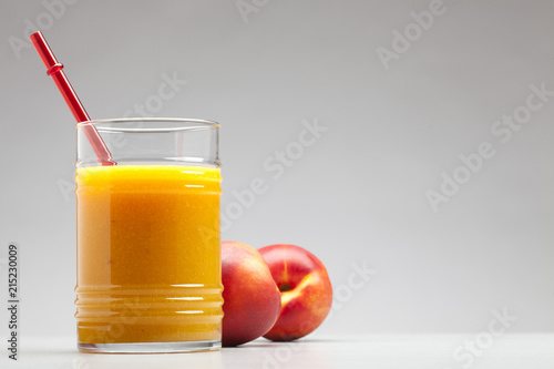 peach juice in glass