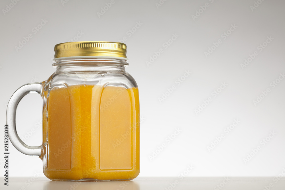 orange smoothie in jar orange smoothie in jar