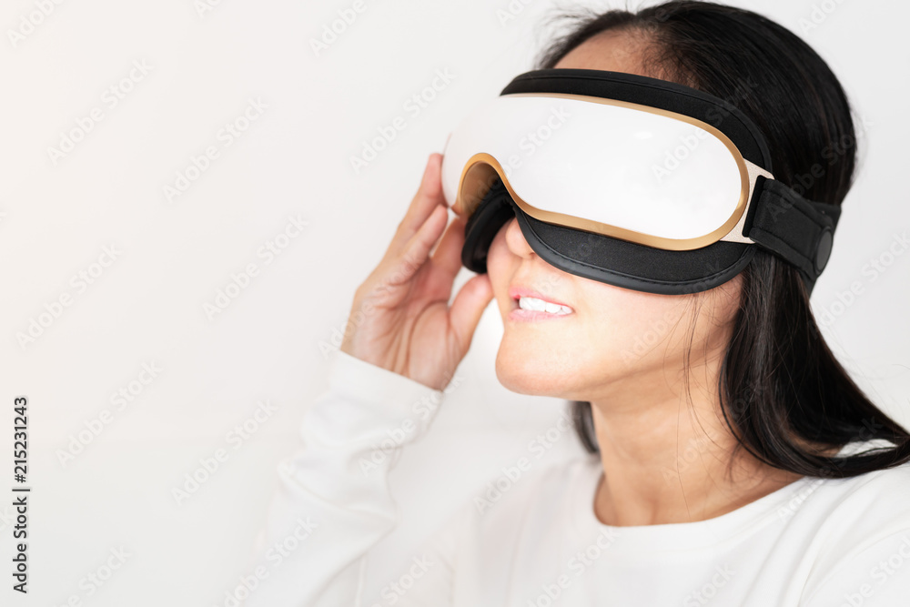 relax and massage, electric eye massage machine on women, closeup, healthcare and medicine concept relax and massage, electric eye massage machine on women, closeup, healthcare and medicine concept