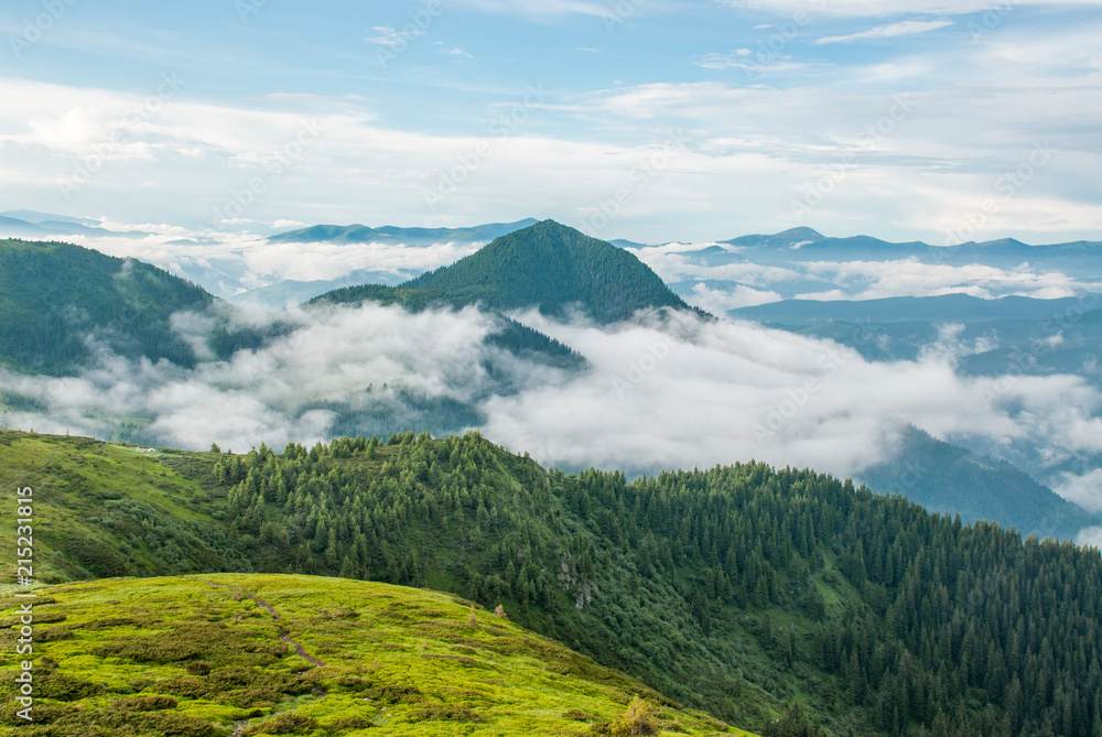 Fototapeta premium Epic view of mountain over cloud after storm