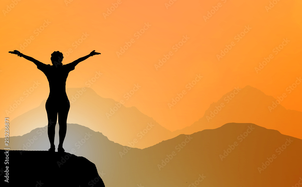 silhouette Woman standing on a mountain with two hand  on blurry sunrise