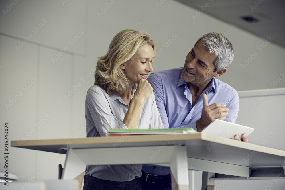 Businesspeople using digital tablet Businesspeople using digital tablet