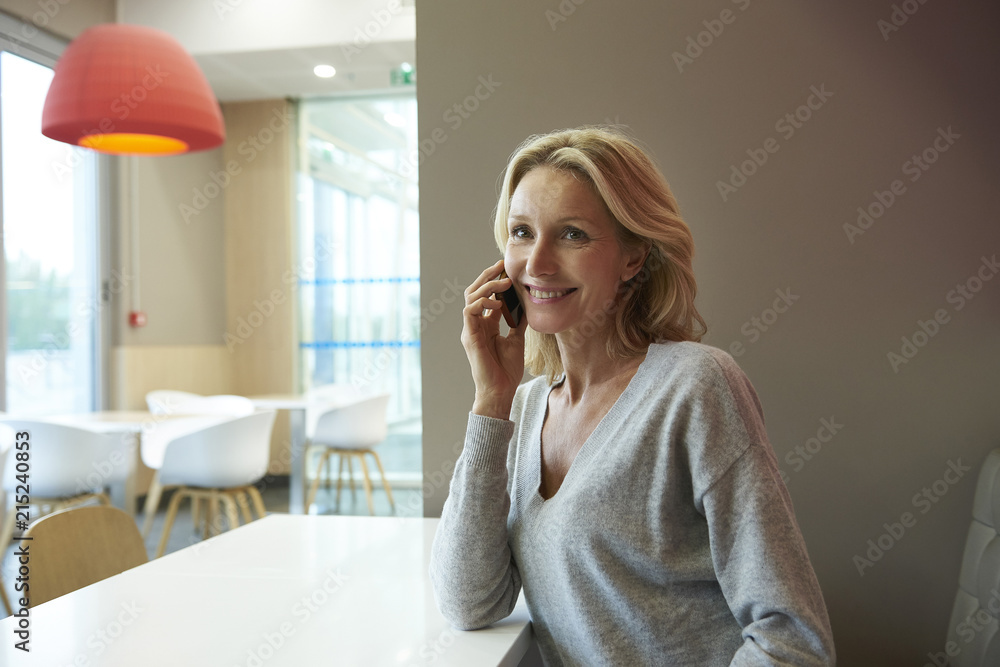 Woman talking on smart phone Woman talking on smart phone