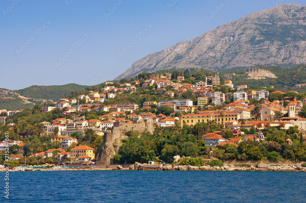 Sunny Mediterranean landscape. Montenegro. View of coastal town of Herceg Novi located at the foot of Mount Orjen