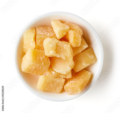Bowl of parmesan cheese isolated on white background