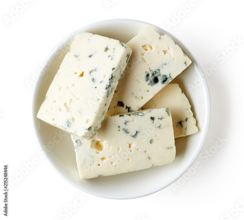 Bowl of blue cheese isolated on white, from above photo