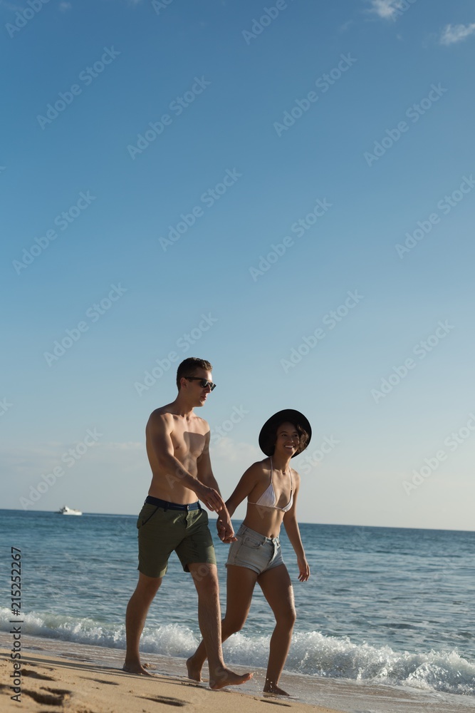 Couple walking together hand in hand