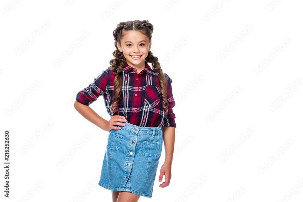 schoolchild in denim skirt and checkered shirt posing isolated on white schoolchild in denim skirt and checkered shirt posing isolated on white