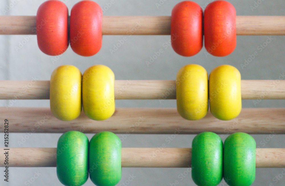 Abacus On Row / Group Of Multi-Color Abacus On Row Helping School Children Understanding Maths In Classroom. Abacus On Row / Group Of Multi-Color Abacus On Row Helping School Children Understanding Maths In Classroom.