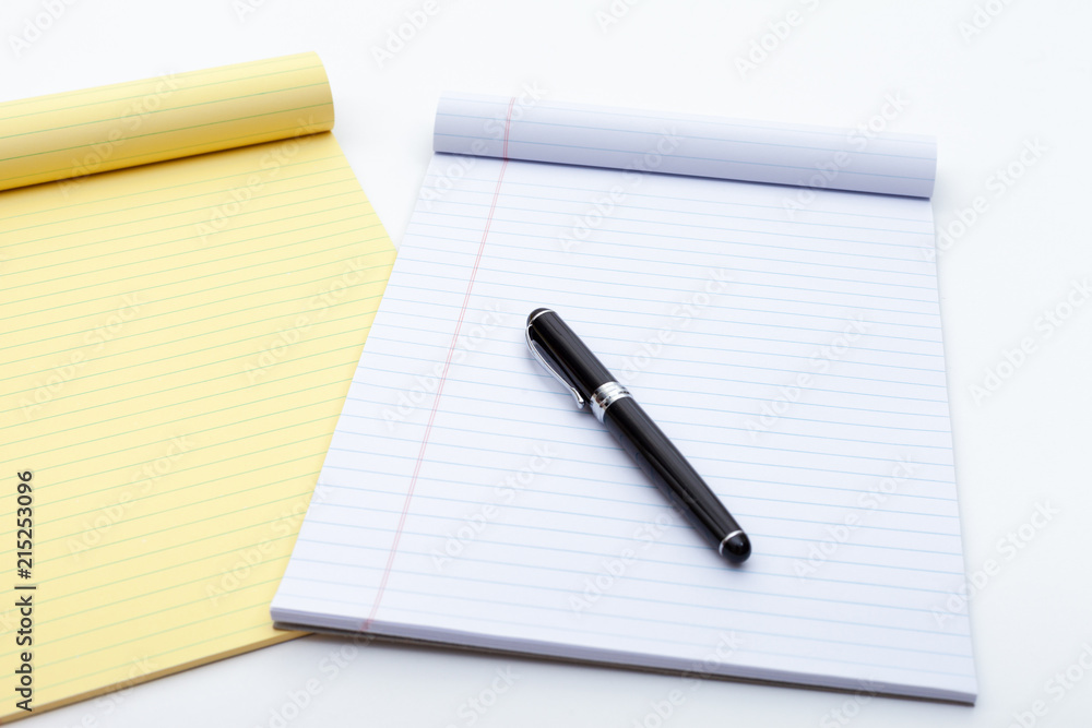 Alarm clock, notes and pen Alarm clock, notes and pen