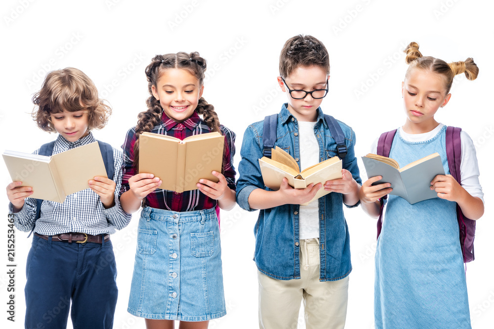 schoolchildren standing and reading books isolated on white schoolchildren standing and reading books isolated on white
