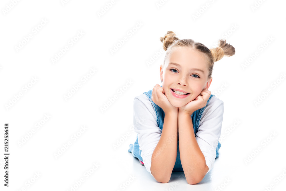 schoolchild lying and resting chin on hands isolated on white schoolchild lying and resting chin on hands isolated on white
