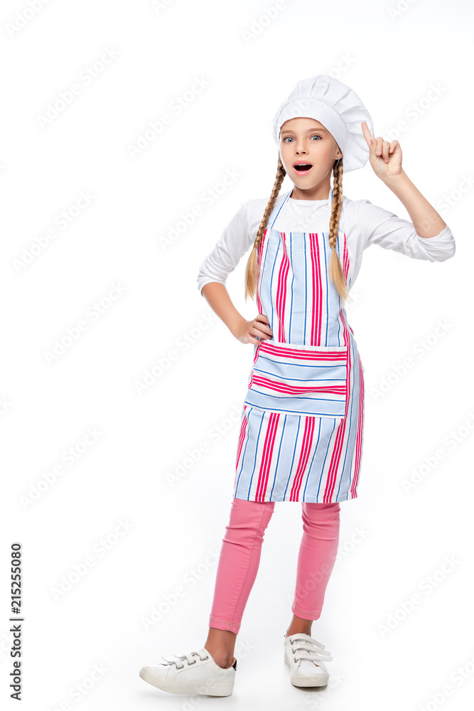 surprised schoolchild in costume of chef showing idea gesture isolated on white surprised schoolchild in costume of chef showing idea gesture isolated on white