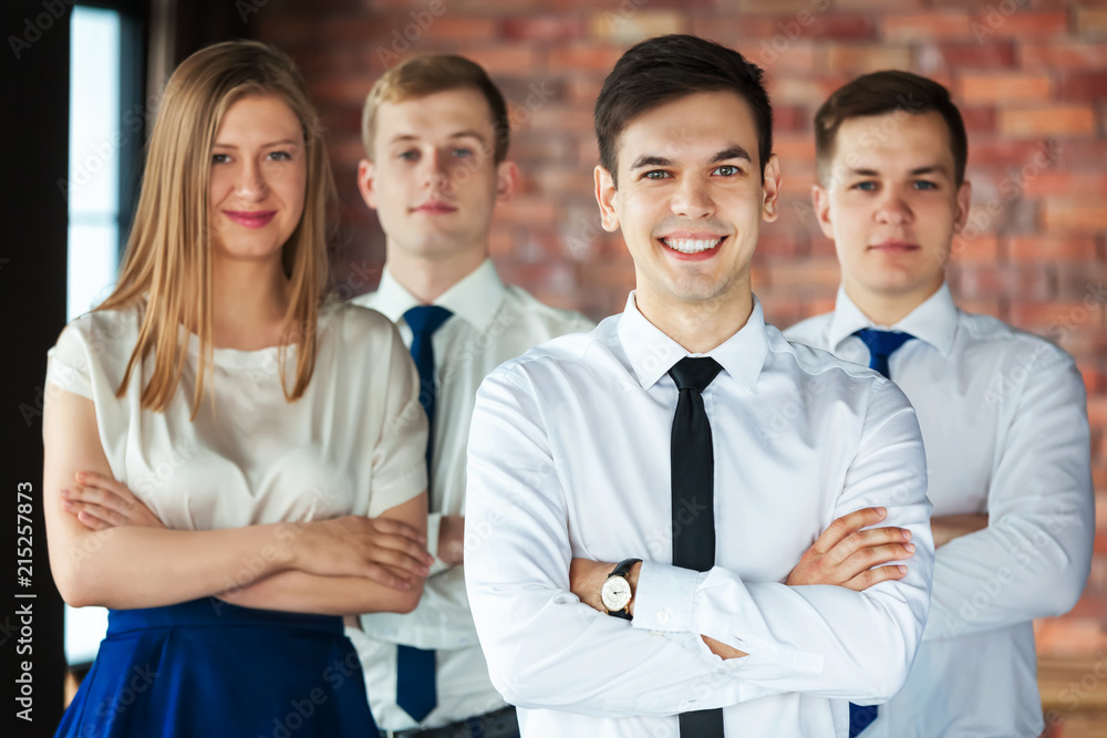 Portrait of young business people looking at camera. Portrait of young business people looking at camera.