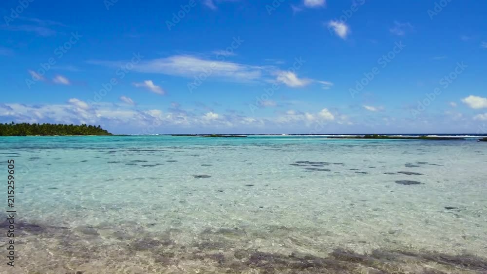 travel, seascape and nature concept - lagoon at tropical beach in french polynesia travel, seascape and nature concept - lagoon at tropical beach in french polynesia