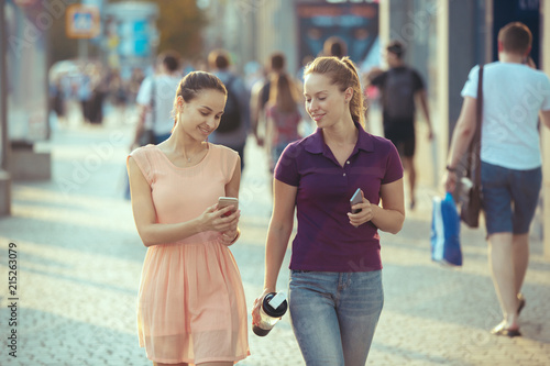 Young Beautiful Women Talking On Mobile Phone Outdoor.
