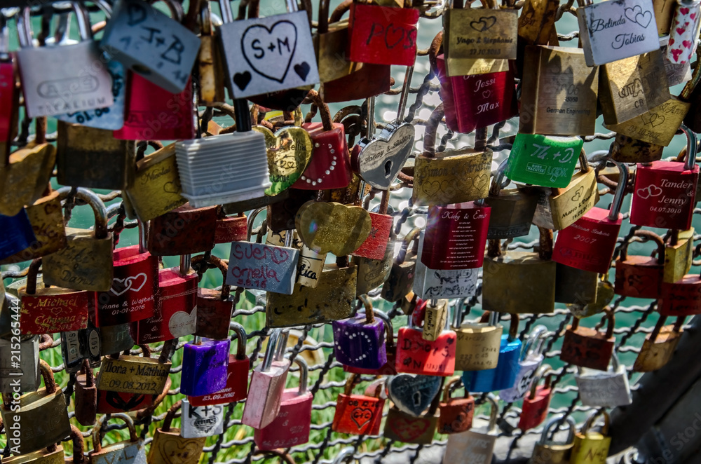 Padlocks on the bridge fence.