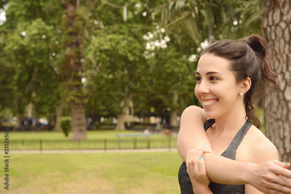 Portrair of young beautiful woman doing exercise at park Portrair of young beautiful woman doing exercise at park