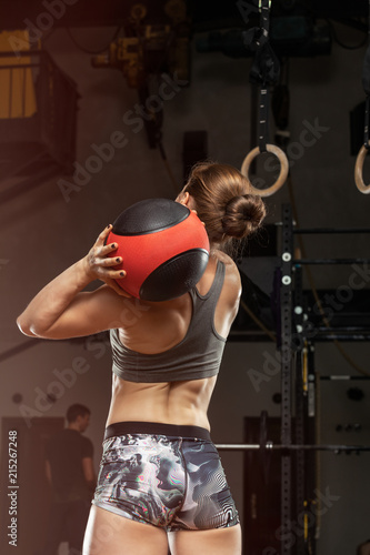 Fototapeta Naklejka Na Ścianę i Meble -  gym hard training woman