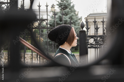 Young woman with black wool hat outdoor photo