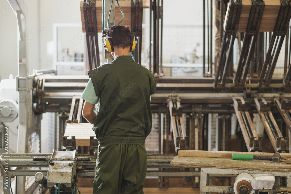 Man Working At The Furniture Factory Man Working At The Furniture Factory