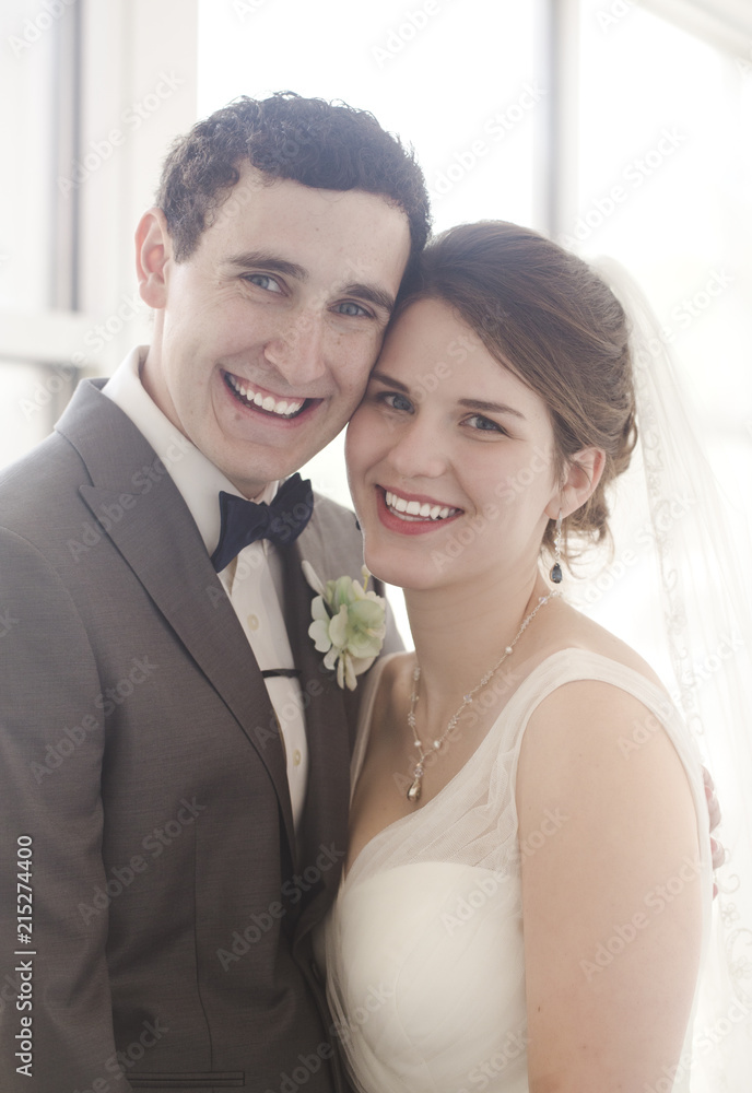 Portrait of a Young Bride and Groom on their Wedding Day Portrait of a Young Bride and Groom on their Wedding Day