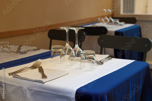 Tableware on the table in italian restaurant