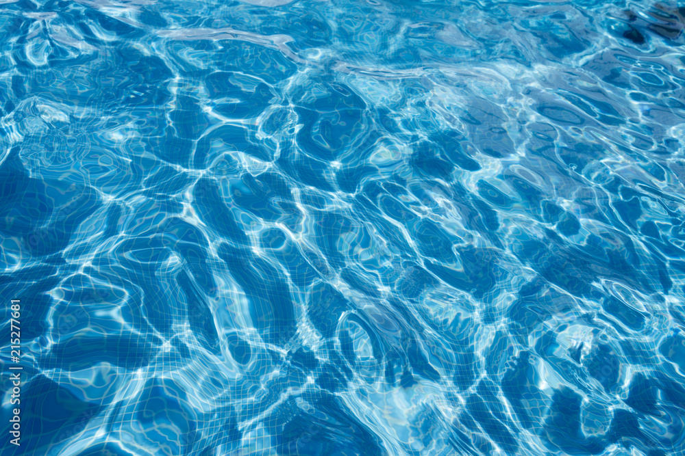 Reflections in the water of a pool.