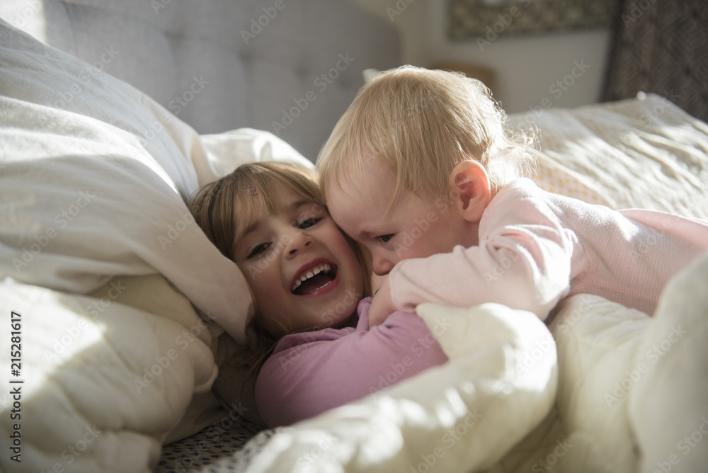 sibling snuggles sibling snuggles