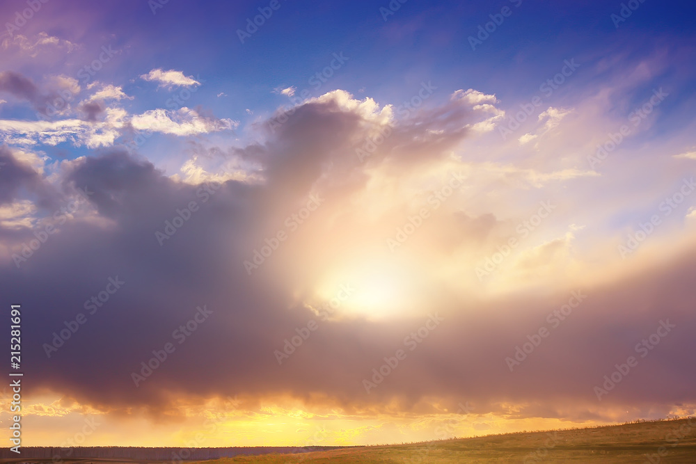 Fototapeta premium sunset in the cloudy sky