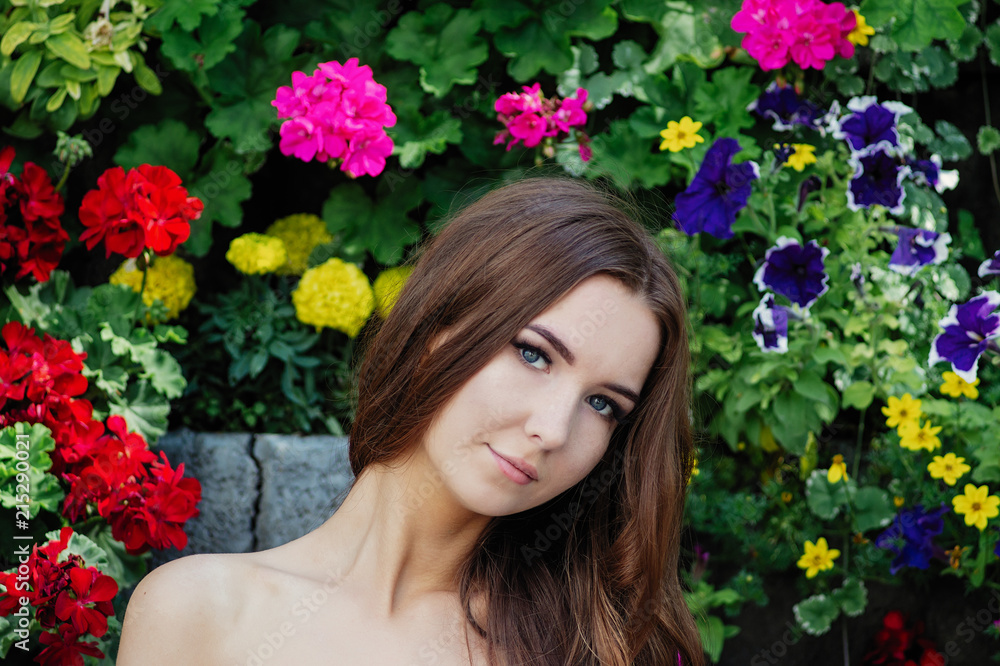 Beautiful fashion model with colorful flowers. Beautiful fashion model with colorful flowers.