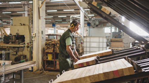 Man Working At The Furniture Factory