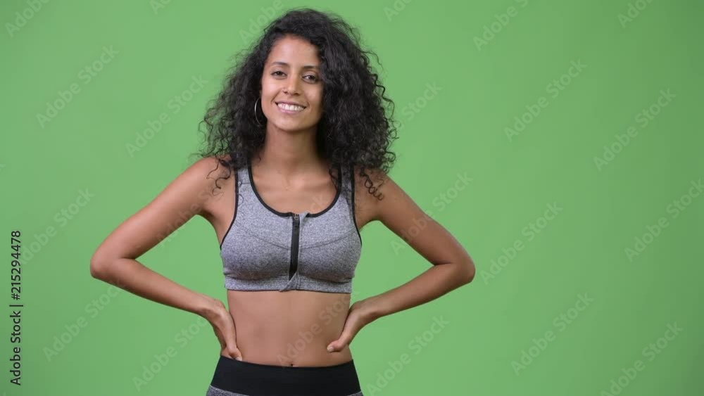 Young happy beautiful Hispanic woman ready for gym Young happy beautiful Hispanic woman ready for gym