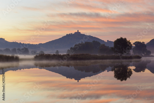 Wachsenburg Castle at Dawn Reflecting in Lake, Drei Gleichen, Ilm District, Thuringia, Germany photo